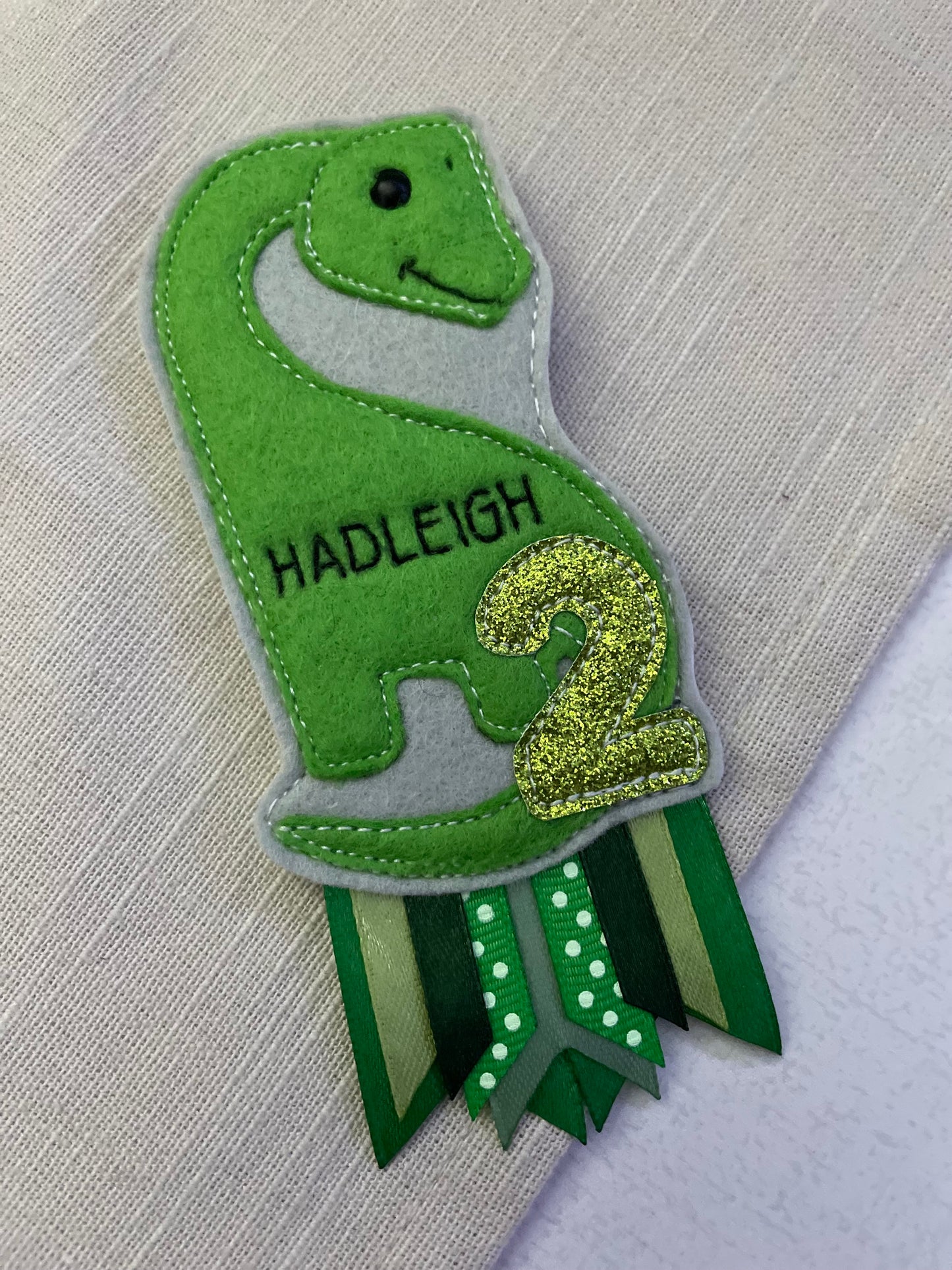Brachiosaurus birthday badge