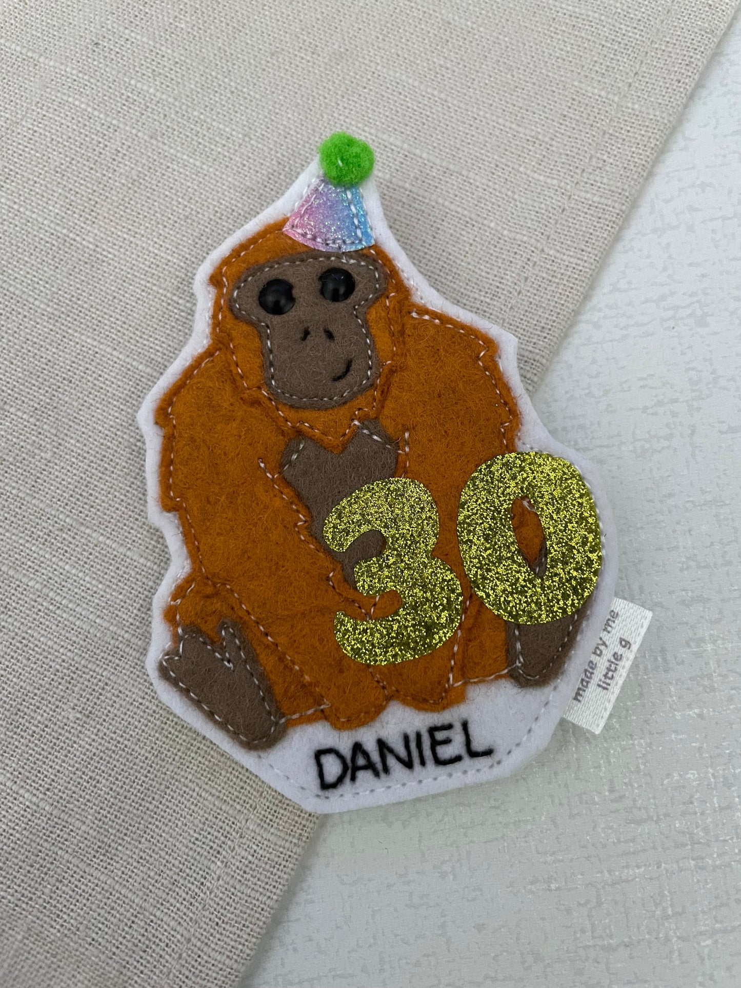 Orangutan birthday badge