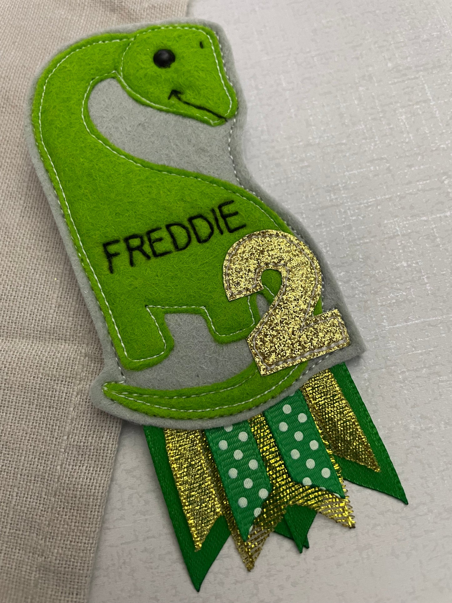 Brachiosaurus birthday badge