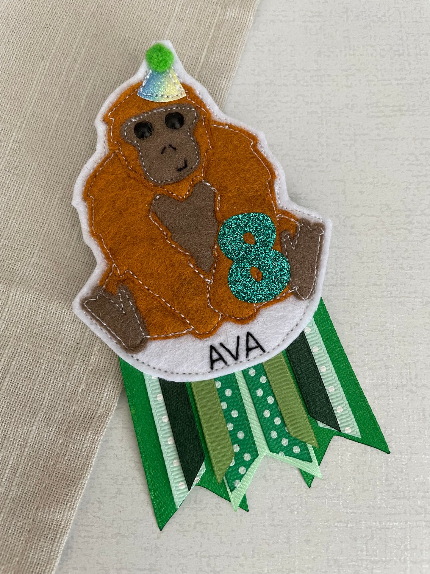 Orangutan birthday badge