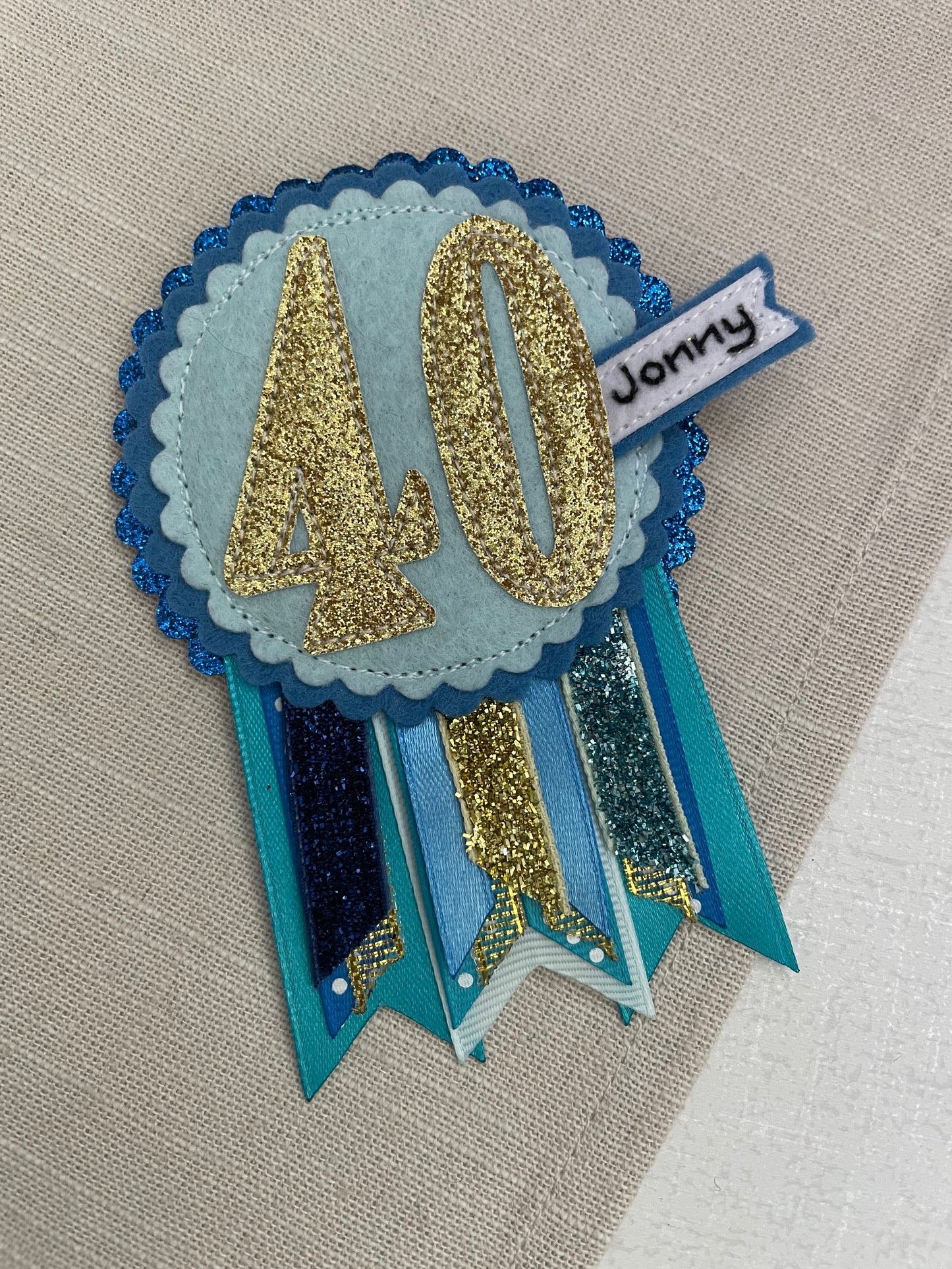 Blue and gold rosette