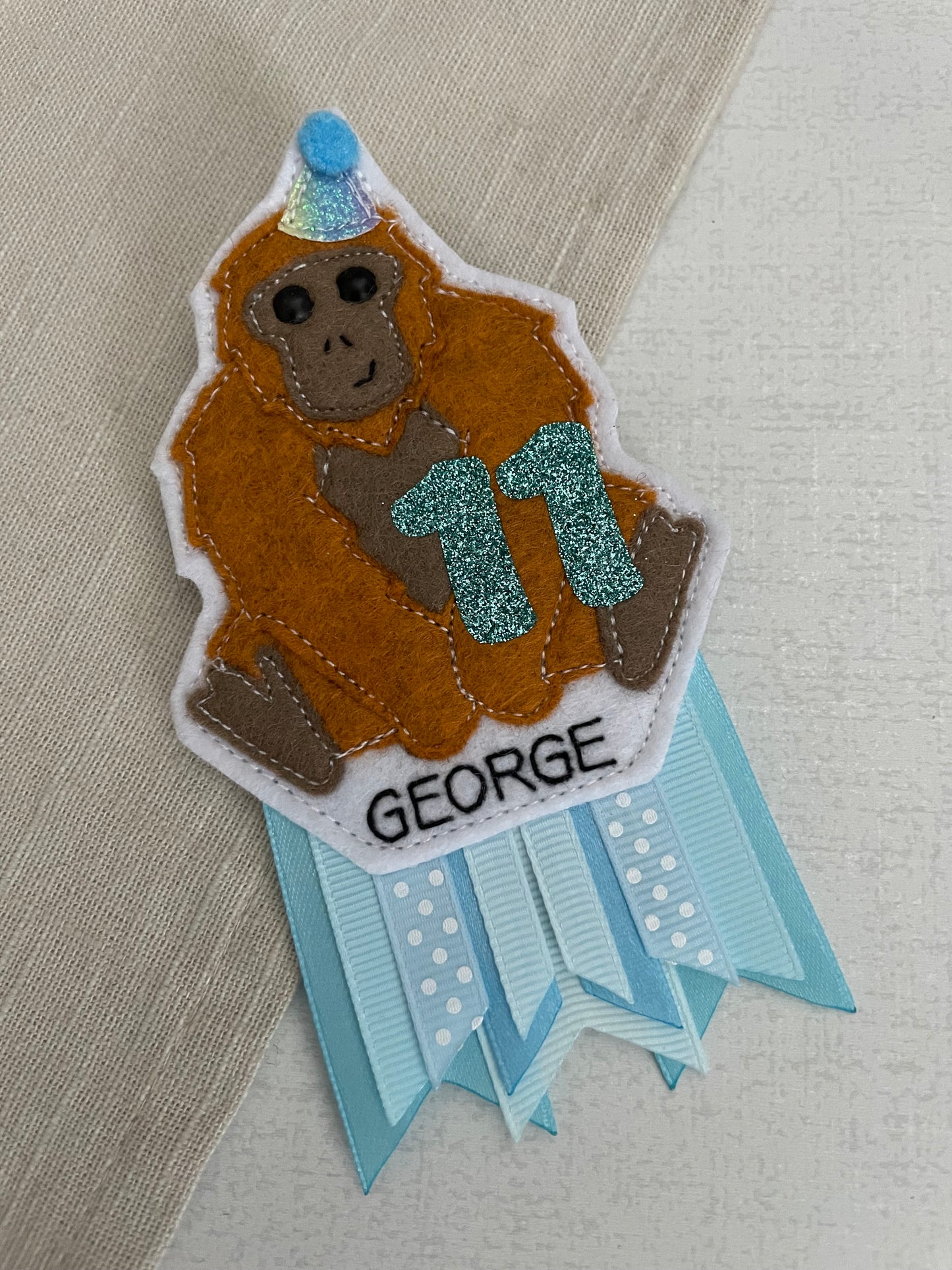 Orangutan birthday badge