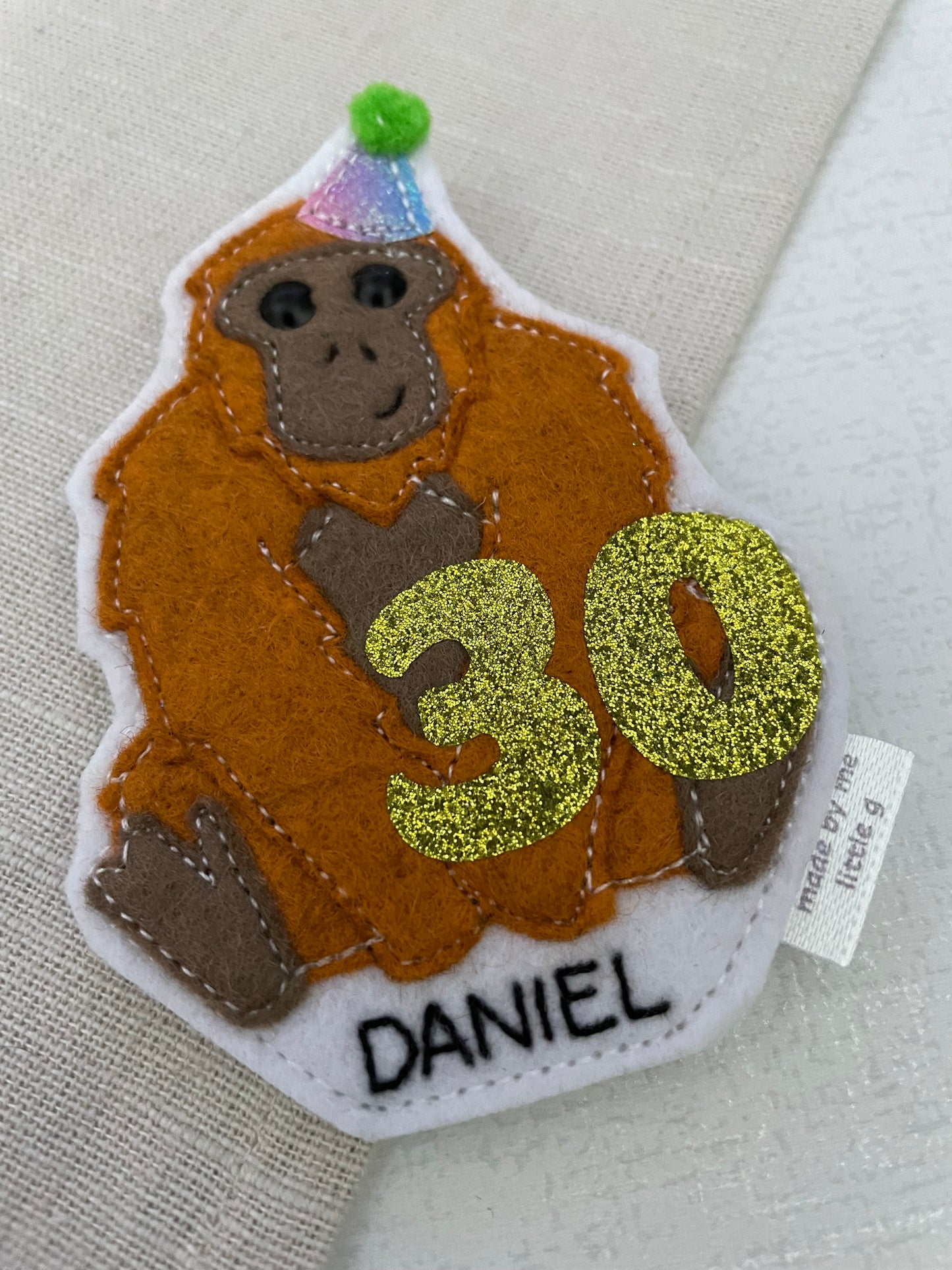 Orangutan birthday badge