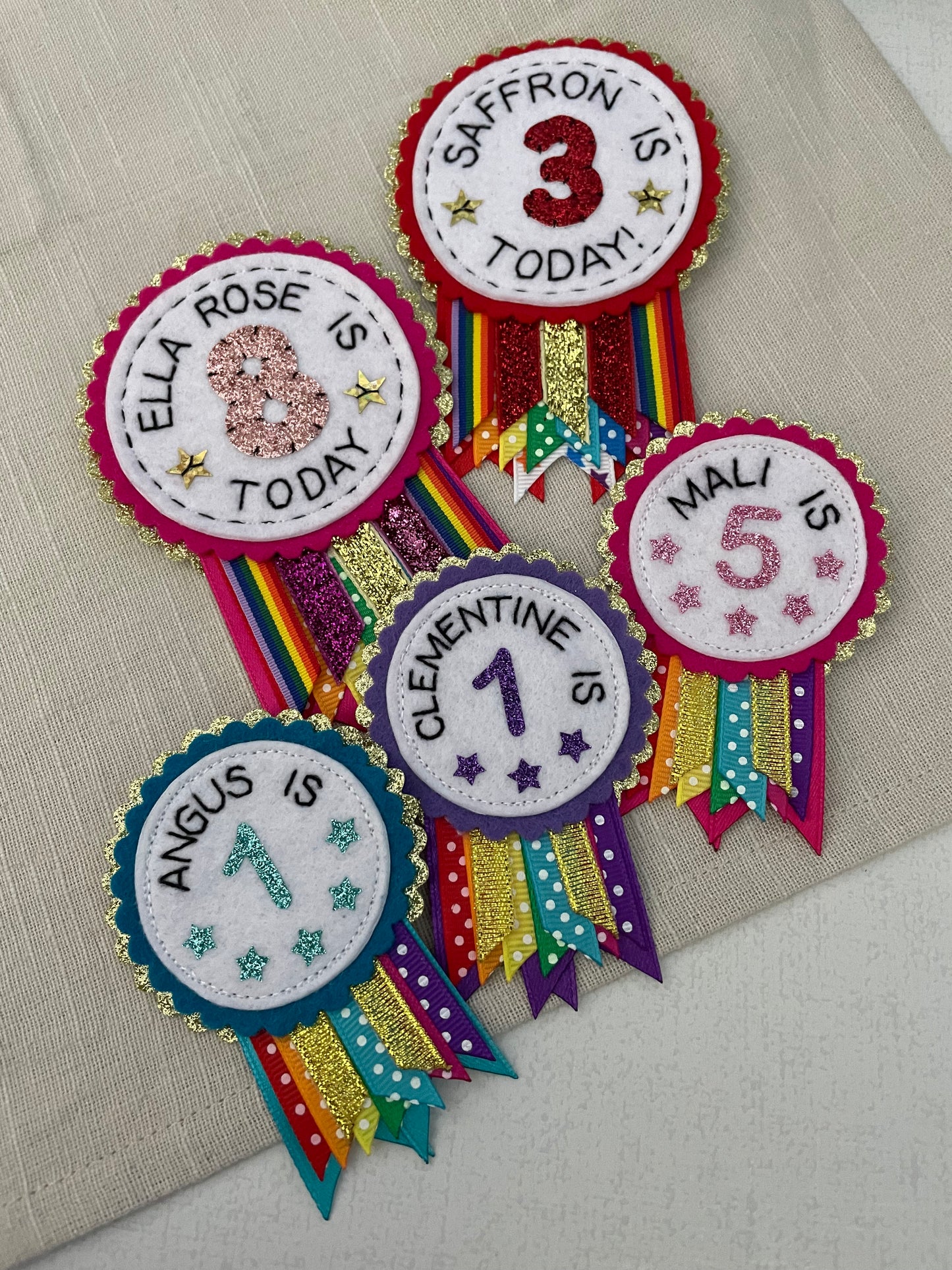 Mini personalised rainbow sparkle rosette