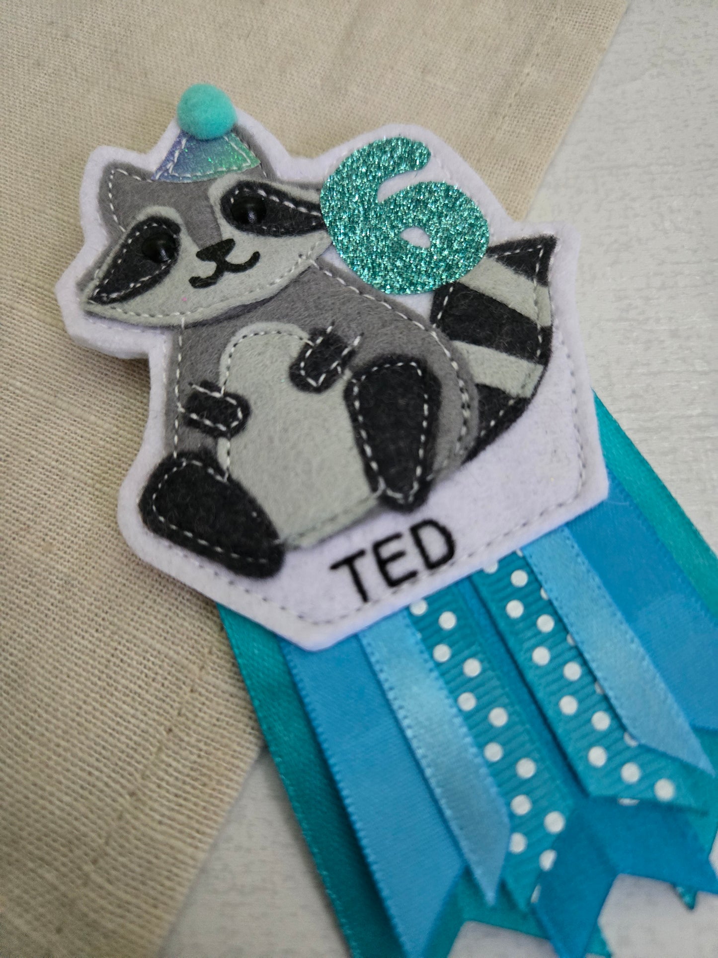 Raccoon birthday badge