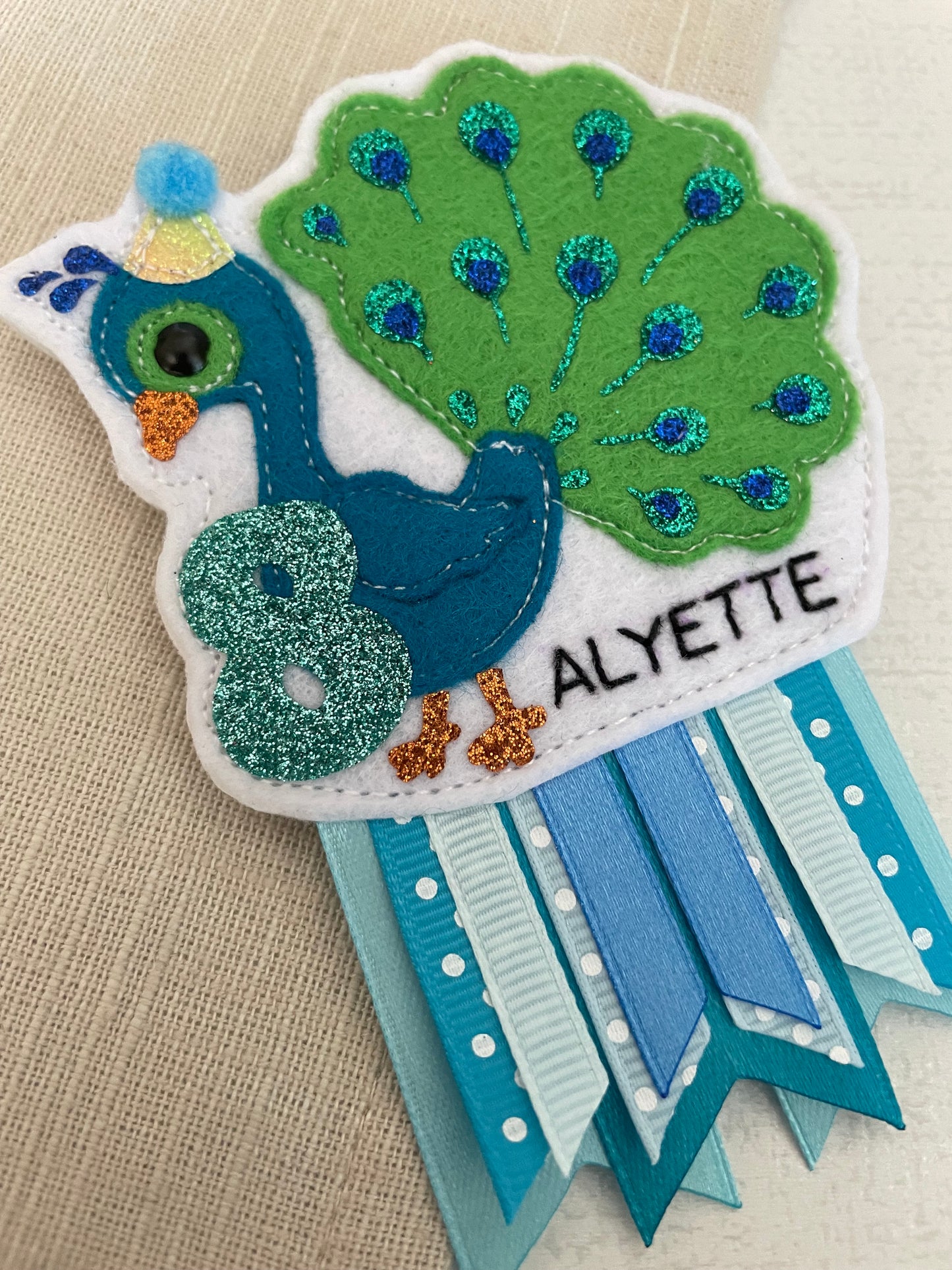 Peacock birthday badge