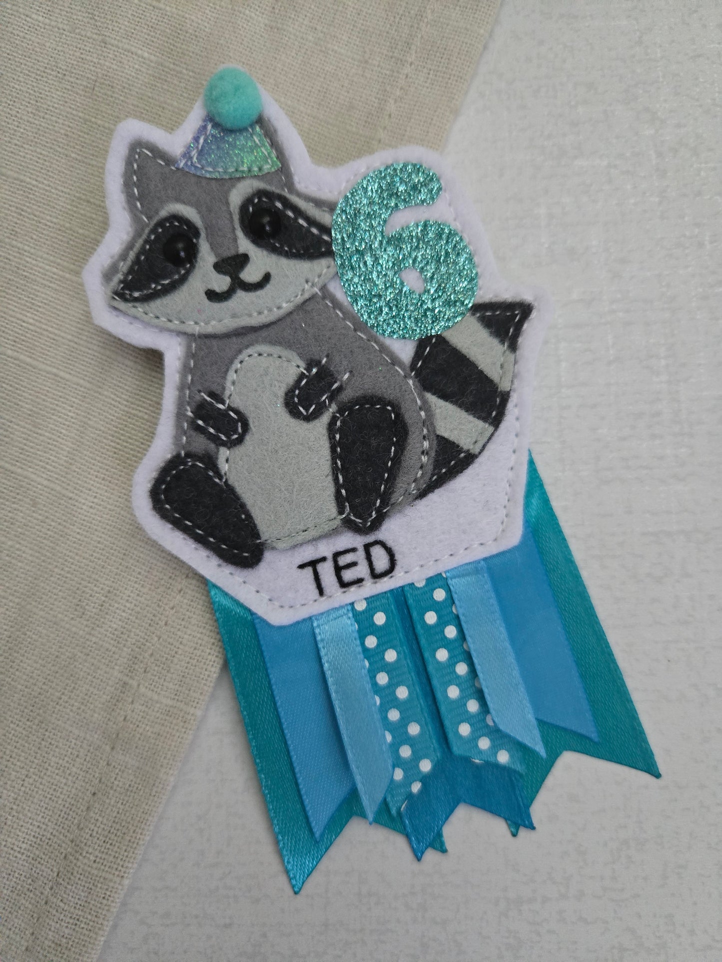 Raccoon birthday badge