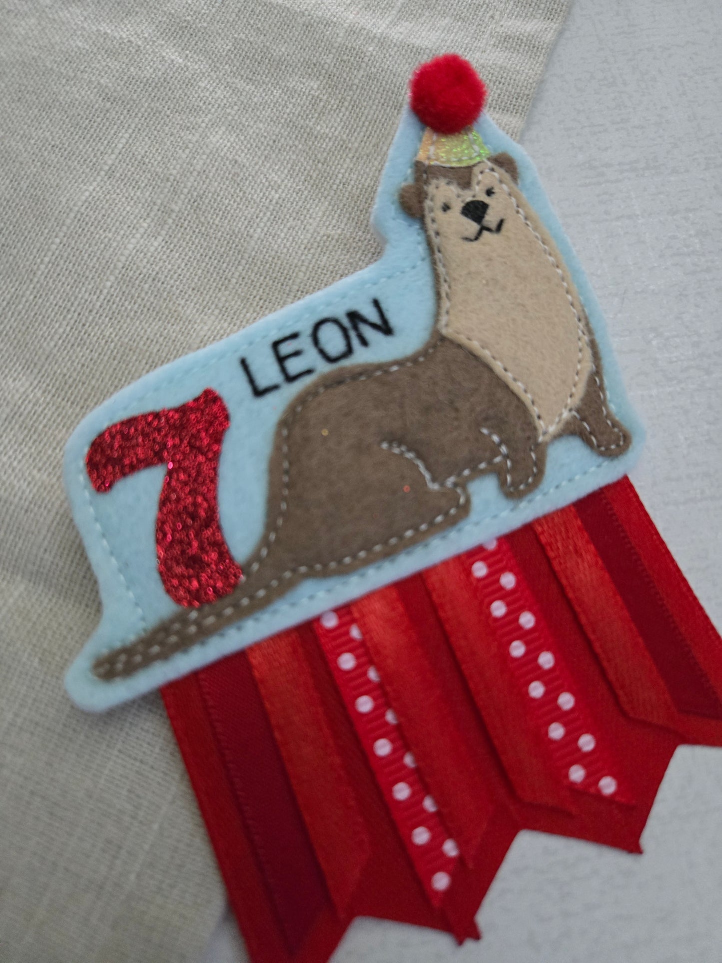 Otter birthday badge